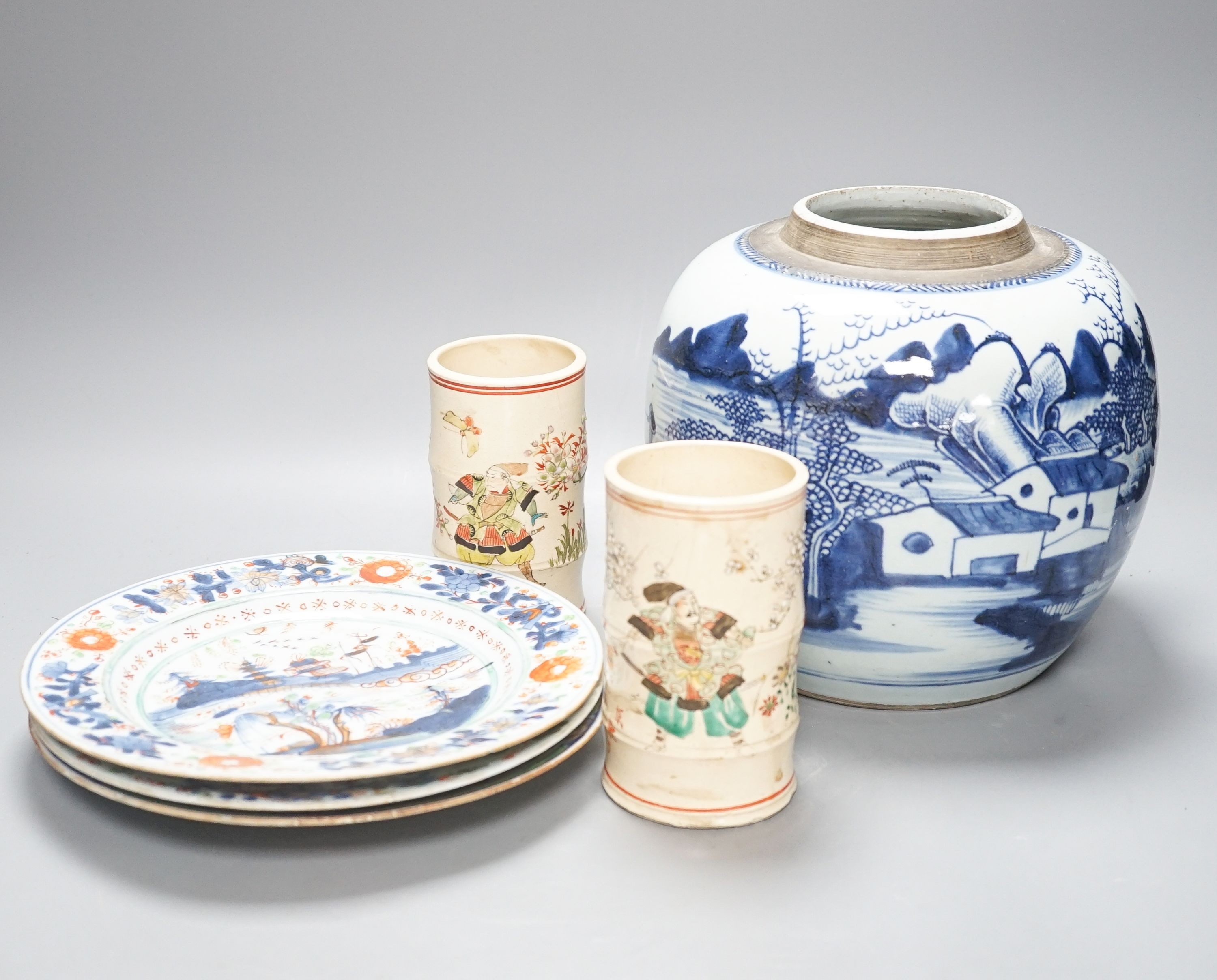 An 18th century Chinese blue and white jar, three 18th century clobbered Chinese plates and a pair of Satsuma vases